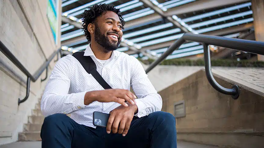 image of employee smiling outside showing how to avoid nonprofit burnout